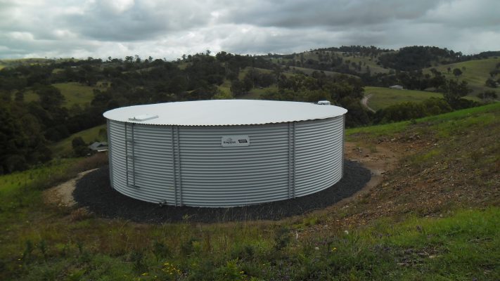 Livestock water tank out in field